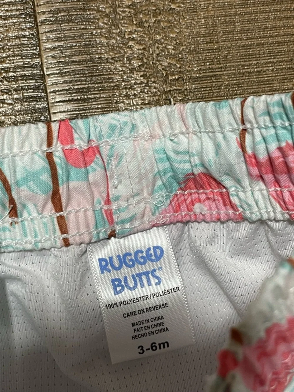 Rugged Butts Baby Swim Trunks with Flamingo Print